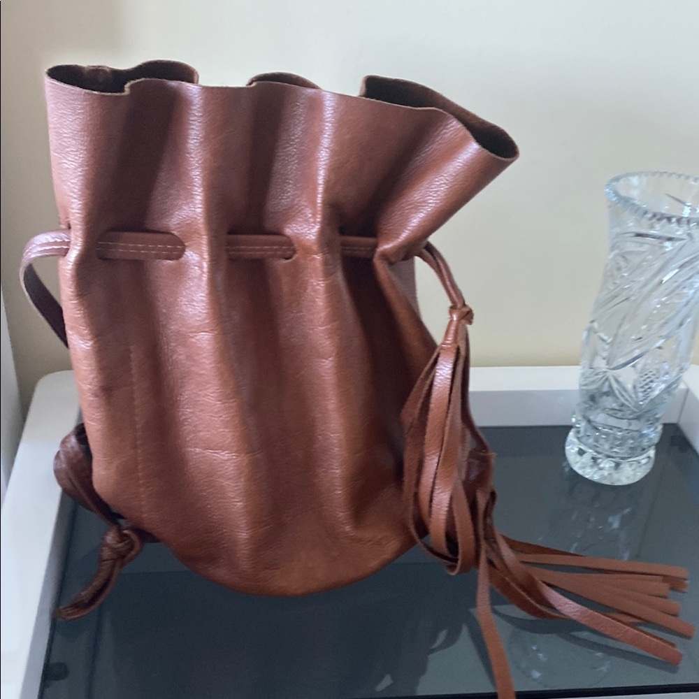 Sophisticated Brown Leather Backpack with Glossy Finish